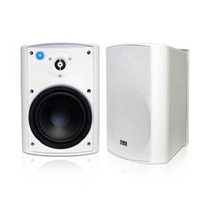 two white speakers sitting next to each other