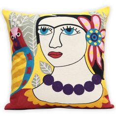 a decorative pillow with an image of a woman and two parrots on the side