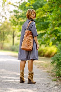 Floral leather bucket bag, Oversized leather tote with flowers for woman, cognac color. Fantasy style. Handmade from high quality Italian leather. Flowers and leaves made of genuine leather are woven into an unusual composition unique to each bag. This set is made in trendy colors: ocher, beige brown, orange. Be creative and create your own unique bag by choosing the colors that suit you personally! You see a unique bag, a single instance. The author will not be able to repeat this bag exactly. Tote With Flowers, Leather Fingerless Gloves, Fantasy Style, Floral Ornament, Big Bag, Leather Flowers, Leather Handbags Tote, Unique Bags, Handmade Bag