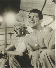 black and white photograph of man and woman smiling