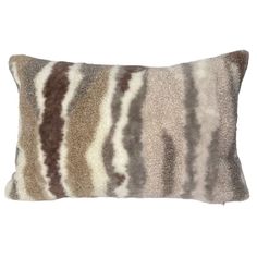 a brown and white striped pillow on a white background with the same color as it is