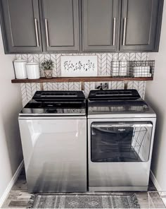 a stove top oven sitting inside of a kitchen next to a wall mounted potted plant