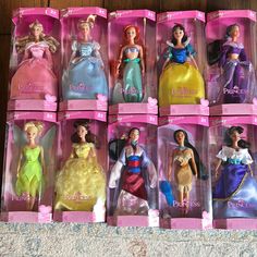 there are many princess dolls in the box