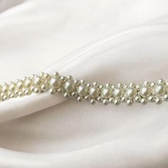 ✨ Attention: Elevate your bridal look with the timeless elegance of the LISALI Pearl Bridal Belt--a perfect blend of sophistication and simplicity. Whether you're a bride, bridesmaid, or attending a special occasion, this delicate pearl belt is designed to add a touch of class to any gown. 💍 Interest: Crafted with high-quality pearls, this belt drapes effortlessly over your waist, highlighting your silhouette without overpowering your dress. The thin design is ideal for those looking for a subt Pearl Wedding Dress Belt, Bridesmaid Belt, Pearl Belt, Pearl Wedding Dress, Wedding Belt, Bridal Accessory, Wedding Dress Belt, Wedding Sash Belt, Pearl Bridal