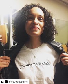 a woman wearing a t - shirt that says you one me 38 cents