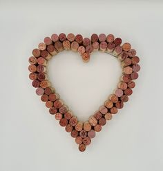 a heart shape made out of wine corks