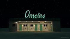 a building with the word onelas lit up at night