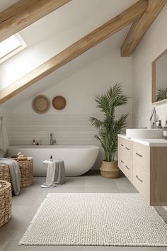 a bathroom with a large white bathtub next to a sink and a toilet in it