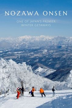 people are skiing on the snow covered mountain top with mountains in the background and text that reads nozawa onsen one of japan's primer winter getaways