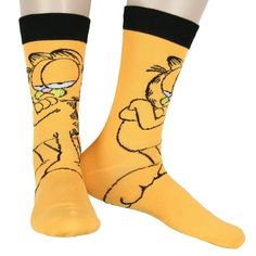 Step into the world of everyones favorite lasagna-loving cat with these vibrant Garfield crew socks. Set against a bright orange background, the socks showcase Garfields classic expression of disappointment, complete with his arms crossed in his signature grumpy style. A black ribbed cuff at the top ensures the socks stay securely in place without bunching, offering style and comfort. These socks are perfect for Garfield fans and cat lovers alike, making them a fun addition to any outfit - wheth Garfield Comic, Silly Socks, Closet Cosplay, Garfield Cat, Garfield Comics, Knit Men, Cat Character, Orange Background, Black Rib