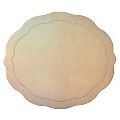 a white plate with a circular design on the front and back side, sitting on a white surface