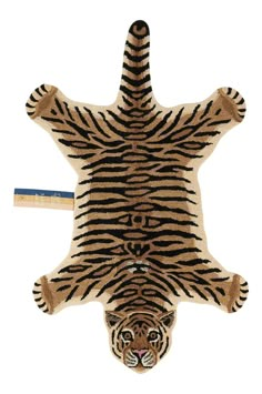 an animal rug with a tiger pattern on it