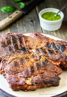 grilled chuck roast on a white plate