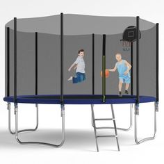 two young boys playing on a trampoline