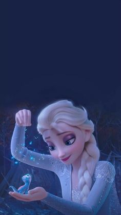 an image of a frozen princess holding her hand up to the sky with snow flakes on