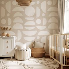 a baby's room with a white crib and beige wallpaper