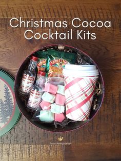 christmas cocoa cocktail kits in a tin on a table with the title overlaying it