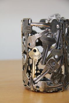 a metal cuff with keys attached to it