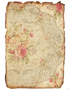 an old piece of paper with flowers and lace on the edges, isolated against a white background