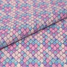 purple and blue fish scale print fabric