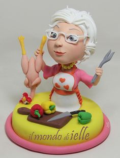 a figurine of a woman holding a knife and fork