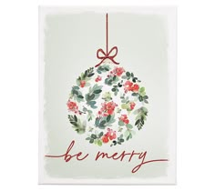 a christmas ornament hanging from a red string with the words be merry written on it