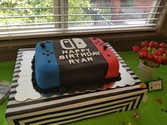 a birthday cake that is sitting on a table