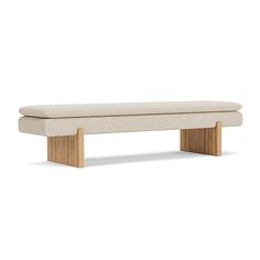 a white bench sitting on top of a wooden frame