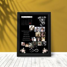 a black framed calendar with pictures and flowers on it in front of a yellow wall