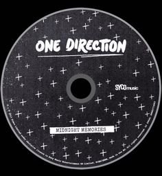 a black and white disc with the words one direction on it, in front of a black background