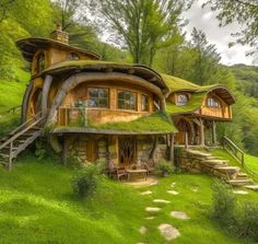 an image of a house that looks like it is made out of wood and grass