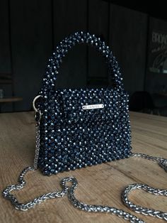 Evening Top Handle Bag With Beaded Details, Black Evening Bags With Bling, Beaded Evening Shoulder Bag With Top Handle, Beaded Top Handle Evening Shoulder Bag, Beaded Top Handle Evening Bag, Beaded Top Handle Shoulder Bag For Evening, Sparkling Crystal Evening Bag, Evening Beaded Top Handle Shoulder Bag, Chic Evening Crystal Bags