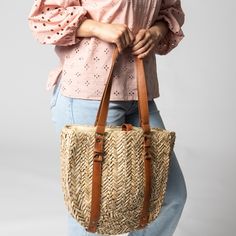 The Jolie seagrass market tote will be your new favorite summer bag. Large enough to store all your beach day essentials yet, sturdy enough to take to your favorite farmers market, it even has a special spot to hold your favorite hat. Features : 100% seagrass lining: 100% polyester 14" wide x 13" tall x 3" deep, 11.5" handle drop Leather hat holding strap Beach Day Essentials, Leather Hat, Everyday Tote, Summer Bag, Leather Hats, Market Tote, Hat Sizes, Farmers Market, Beach Day