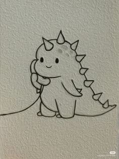 a drawing of a small dinosaur with spikes on its head