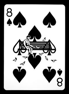 a black and white playing card with fours of spades on the back side