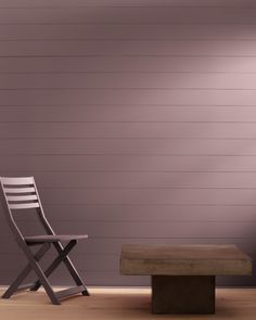 a wooden bench sitting next to a chair in front of a wall with planks