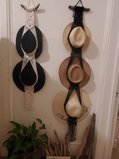 This beautiful hat hanger is made with natural macrame cord and driftwood from Santa barbara California beaches. Macrame Wall Hanging For Hats, Macrame Hat Hanger Western, Macrame Hat Hanger Double, Macrame Boho Hat Hanger, Double Hat Hanger Macrame, Juju Hat Macrame, Guitar Hanger Macrame, Simple Macrame Hat Hanger, Macrame Hat Hanger