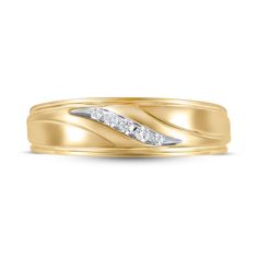 a yellow gold wedding band with three diamonds