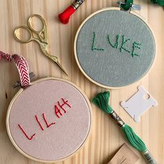 two embroidery hoops with words like i love you and l'aliah written on them