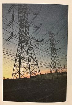 an old photo of power lines at sunset