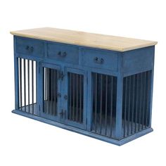 a blue dog crate with two doors and one drawer on the top, is shown