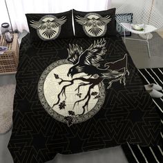 a black and white bed with an eagle on it