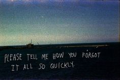 a boat is in the water with a message written on it that says please tell me how you forgot it all so quickly