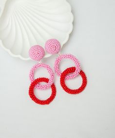 Pink and Red Hoop earrings. Ideal for evening and daily look. Round dangles earrings made of high-quality beaded and rings. CUSTOM ORDER It is Fully HANDMADE earrings and if you want to purchase this earring in a different color or size, send me please a direct message. If you have any questions don't hesitate to ask me. Please visit my shop to see more models made by me https://www.etsy.com/shop/LaranBijou DIMENSIONS Length - 8cm (3inch) Weight 15 grams Clip-On earrings Stud earrings SHIPPING I Pink Dangle Hoop Earrings For Summer, Summer Pink Dangle Hoop Earrings, Trendy Pink Hoop Earrings With Round Beads, Pink Hoop Beaded Earrings, Red Small Hoop Earrings For Summer, Trendy Red Hoop Earrings, Red Colorful Beads Hoop Earrings, Red Hoop Earrings With Colorful Beads, Red Beaded Round Hoop Earrings