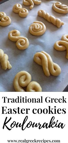 traditional greek easter cookies kohlepaken on a baking sheet with text overlay