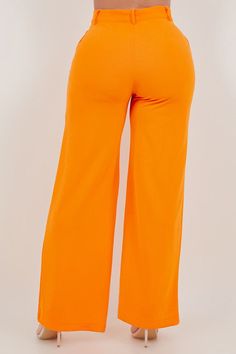 Stand out in style with these vibrant orange pants that are perfect for any occasion. Made from high-quality fabric, these pants offer both comfort and style. Feature 1: High waist design for a flattering fit Feature 2: Front zipper and pockets for added convenience Feature 3: Wide leg for a trendy look Feature 4: Stretchable material for ease of movement Model is wearing a size Large Orange Solid Bottoms For Spring, Orange Solid Color Bottoms For Spring, High Waist Orange Bottoms, Orange Wide Leg Pants With Pockets For Fall, Trendy Stretch Orange Pants, Orange Wide Leg Pants With Pockets For Work, Chic Orange Cotton Pants, Chic Orange Wide Leg Pants With Pockets, Orange Wide Leg Work Pants With Pockets