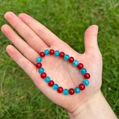 This Is A Handmade Cracked Glass Beaded Bracelet With Red And Blue Beads. This Would Be Great To Wear Over The Summer, Like For The Fourth Of July, Or To Just Be Able To Add A Bit Of Color To Any Outfit. This Bracelet Is Fitted And Won't Move Around Much When You Are Wearing It. Bundles And Reasonable Offers Welcome! Handmade, Red, Dark Blue, Fourth Of July, Summer, Pretty, Bright, Colorful, Cute, Cutesy, Girly, Sweet, Simple, Casual, Beautiful, Flashy, Multicolored, Holiday Red And Blue Jewelry, Handmade Red Stretch Bracelet For Beach, Boho Cuff, Glass Beaded Bracelet, Purple Bracelet, Handmade Sellers, Beads Bracelet Design, Enamel Bangle, The Fourth Of July