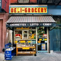 a store front with the name deli grocery on it's side