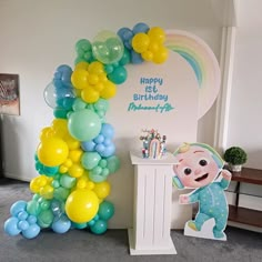 a birthday party with balloons and decorations