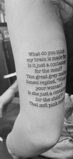 a person with a tattoo on their arm that reads, what do you think my brain is made up?